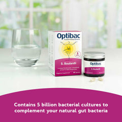 Probiotic capsules displayed beside the bottle