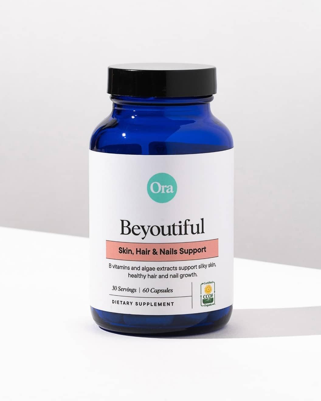 Close-up of BeYouTiful capsules from Ora Organic