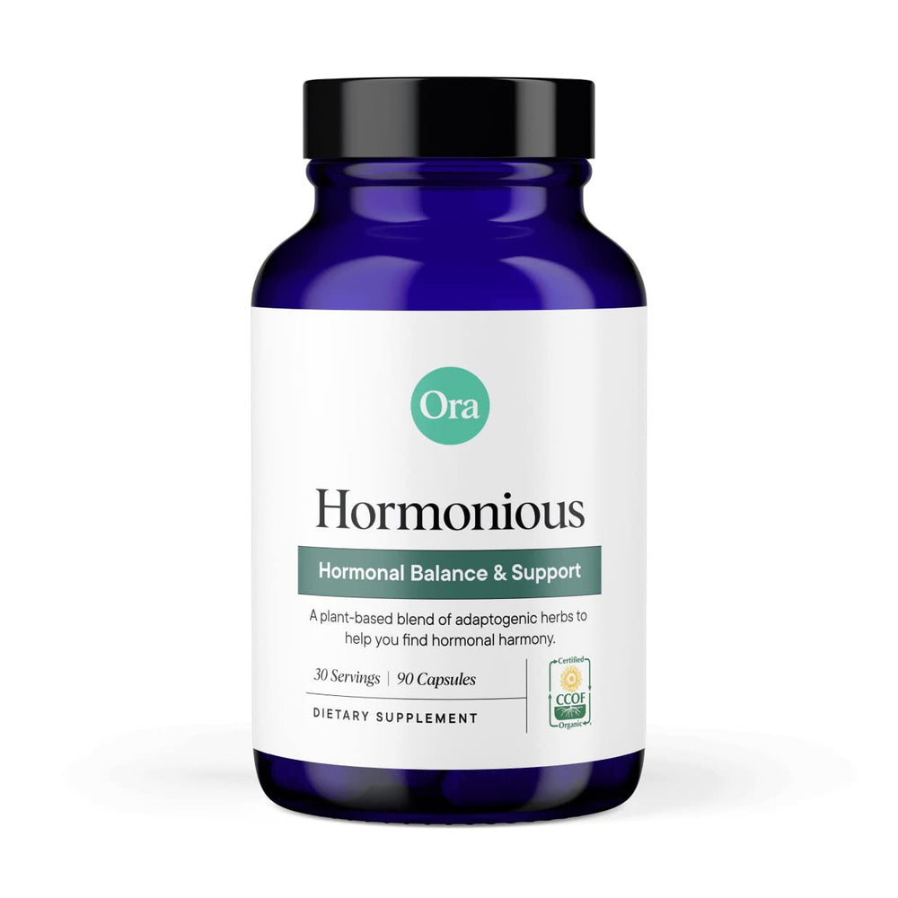 Ora Organic Hormone Balance bottle pour image showing easy daily capsule ritual for balance