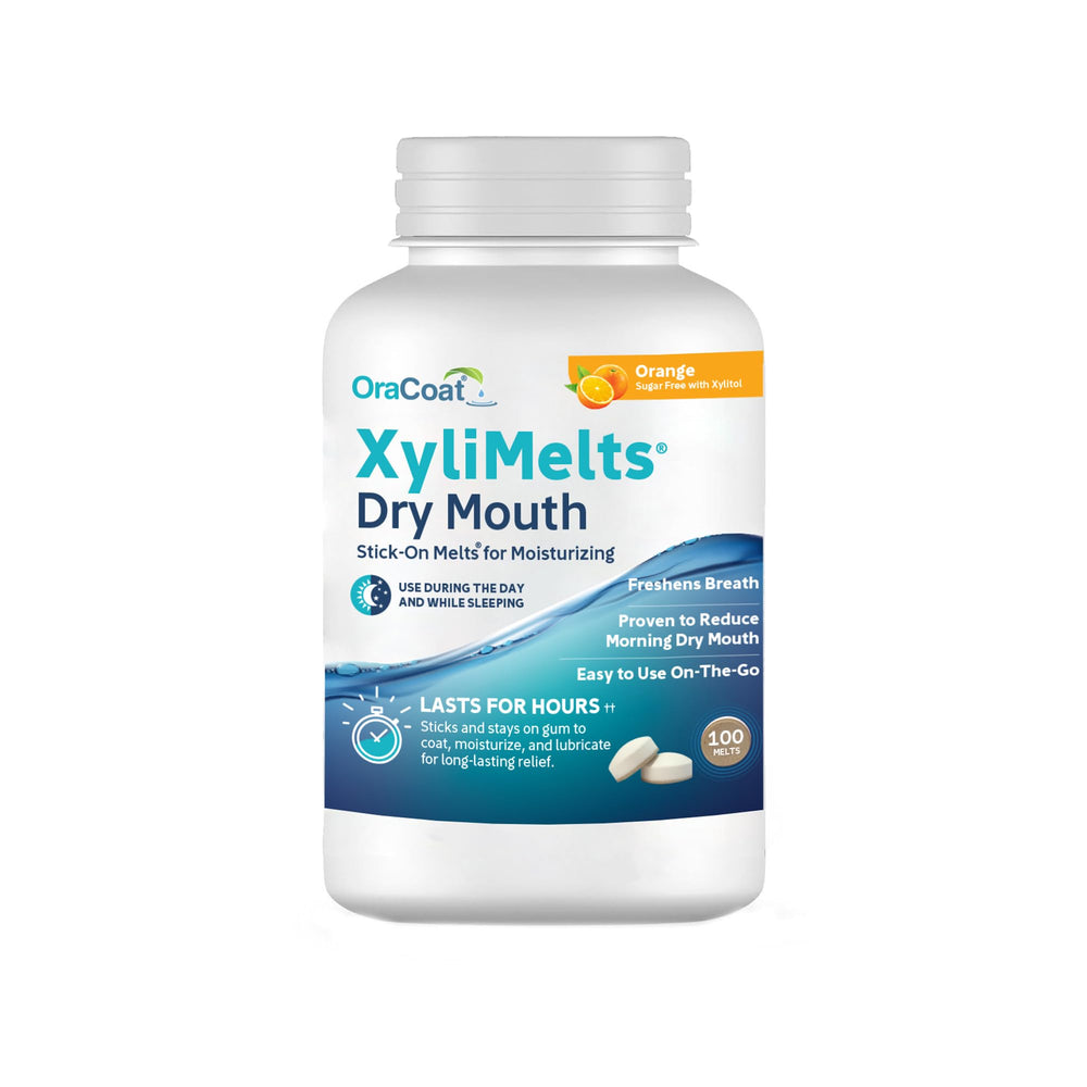 Oracoat XyliMelts orange disc adhering to gums for long-lasting dryness relief