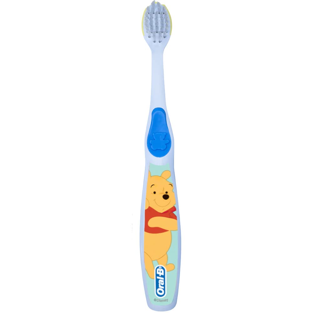 Cushioned brush head protecting tender gums