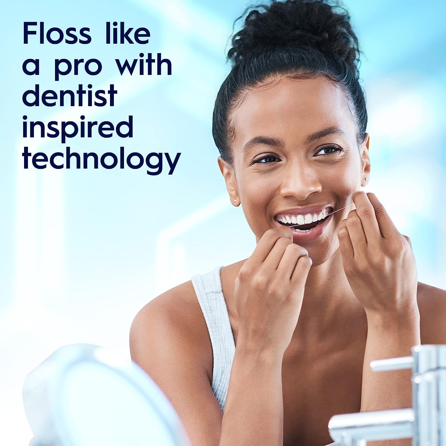 Close-up of Oral-B Glide PRO floss between teeth