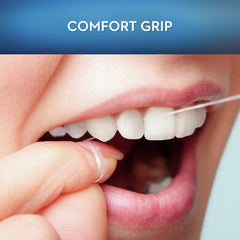 Oral-B Satin Dental Floss Mint box and spool arrangement