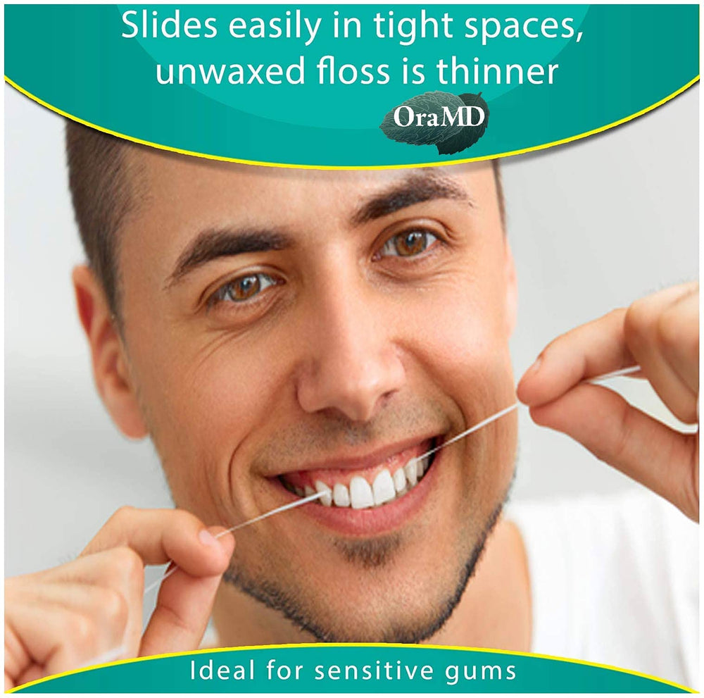 Floss sliding easily between teeth with OraMD
