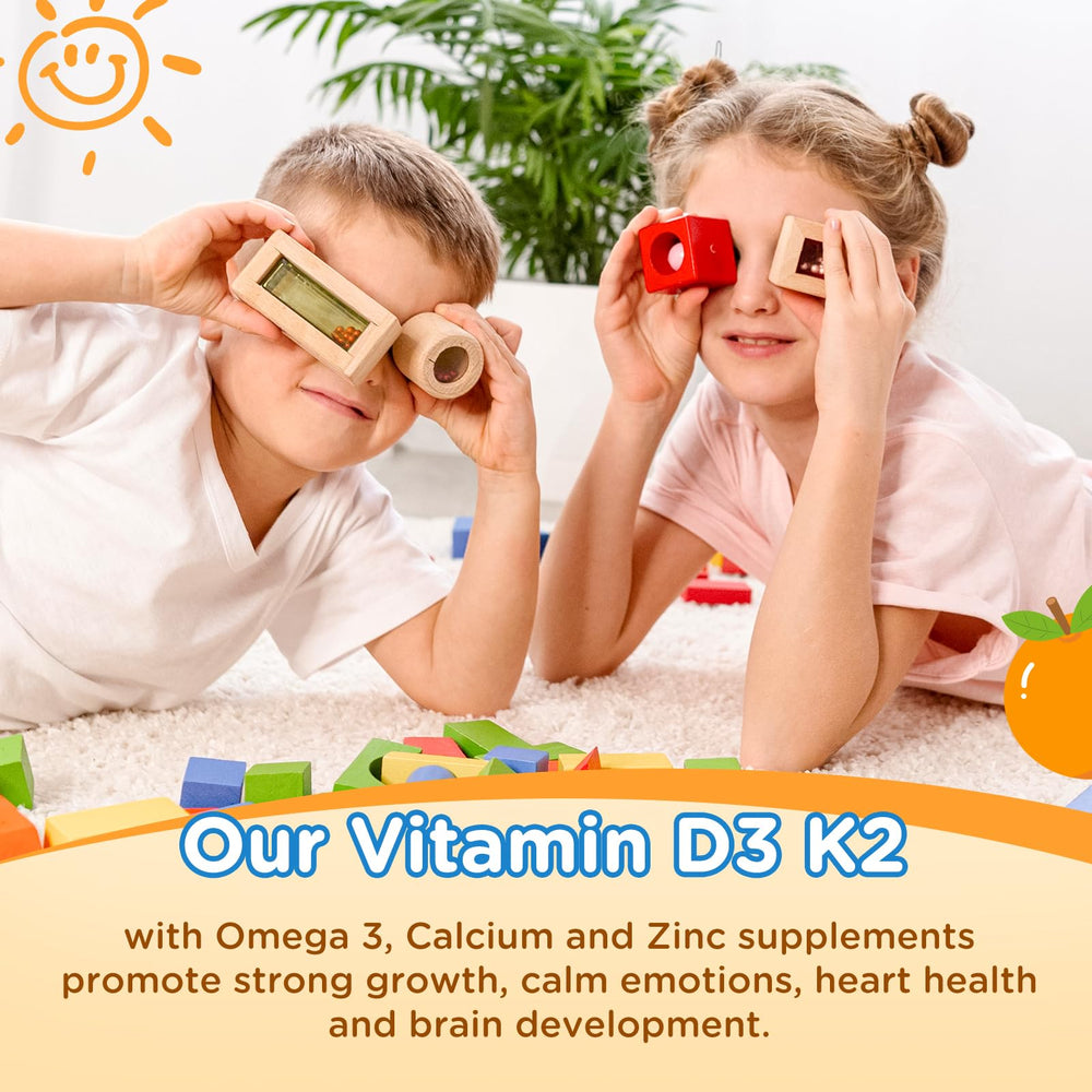 Orange-flavored kids vitamin D3 K2 drops served in a glass