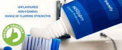 Close-up of toothpaste tube label showing 1450ppm fluoride