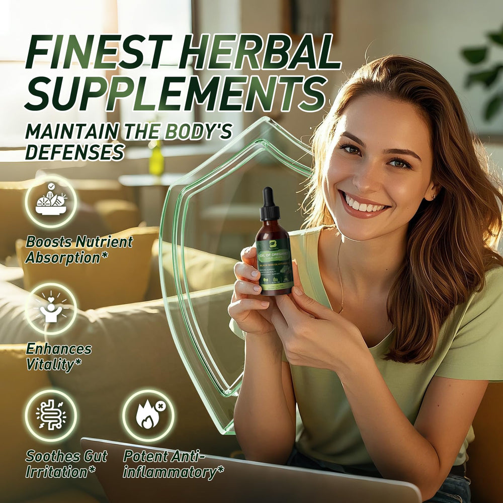 Droplet being dispensed from oregano oil drops bottle