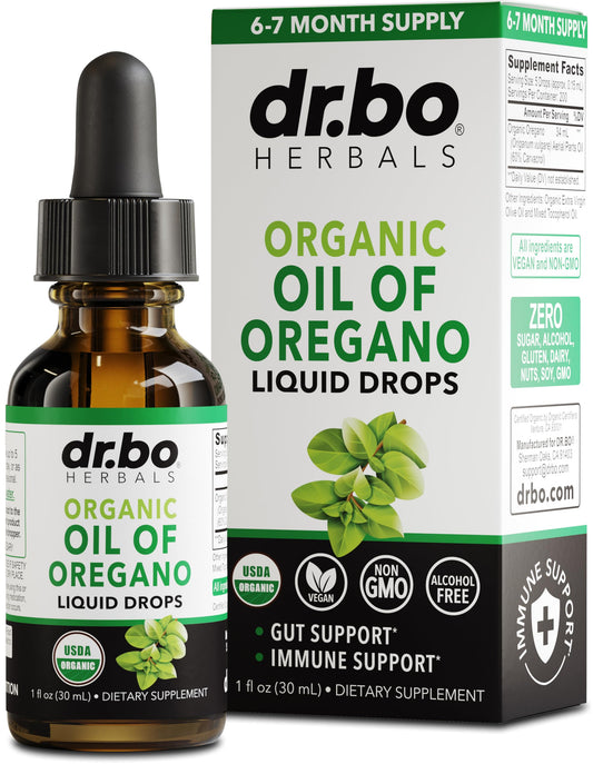 Bottle of oregano oil organic liquid drops 1 oz with dropper