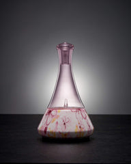 Organic Aromas Opulence pink hand-blown glass reservoir diffuses fragrance gracefully