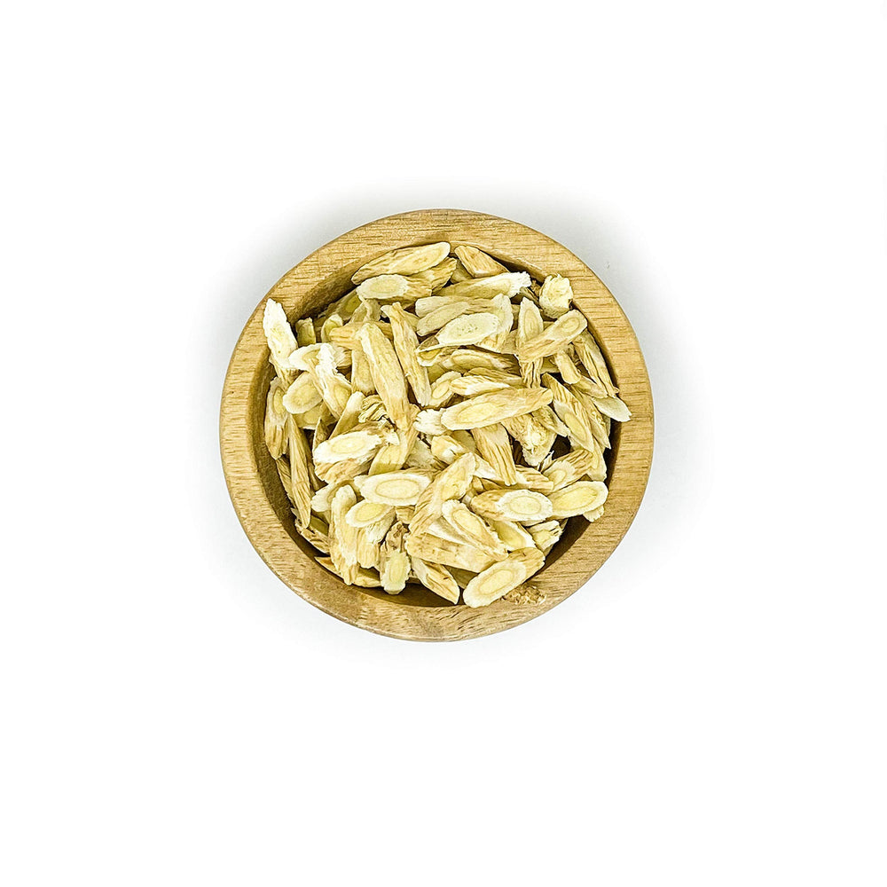 Astragalus root slices arranged for infusion