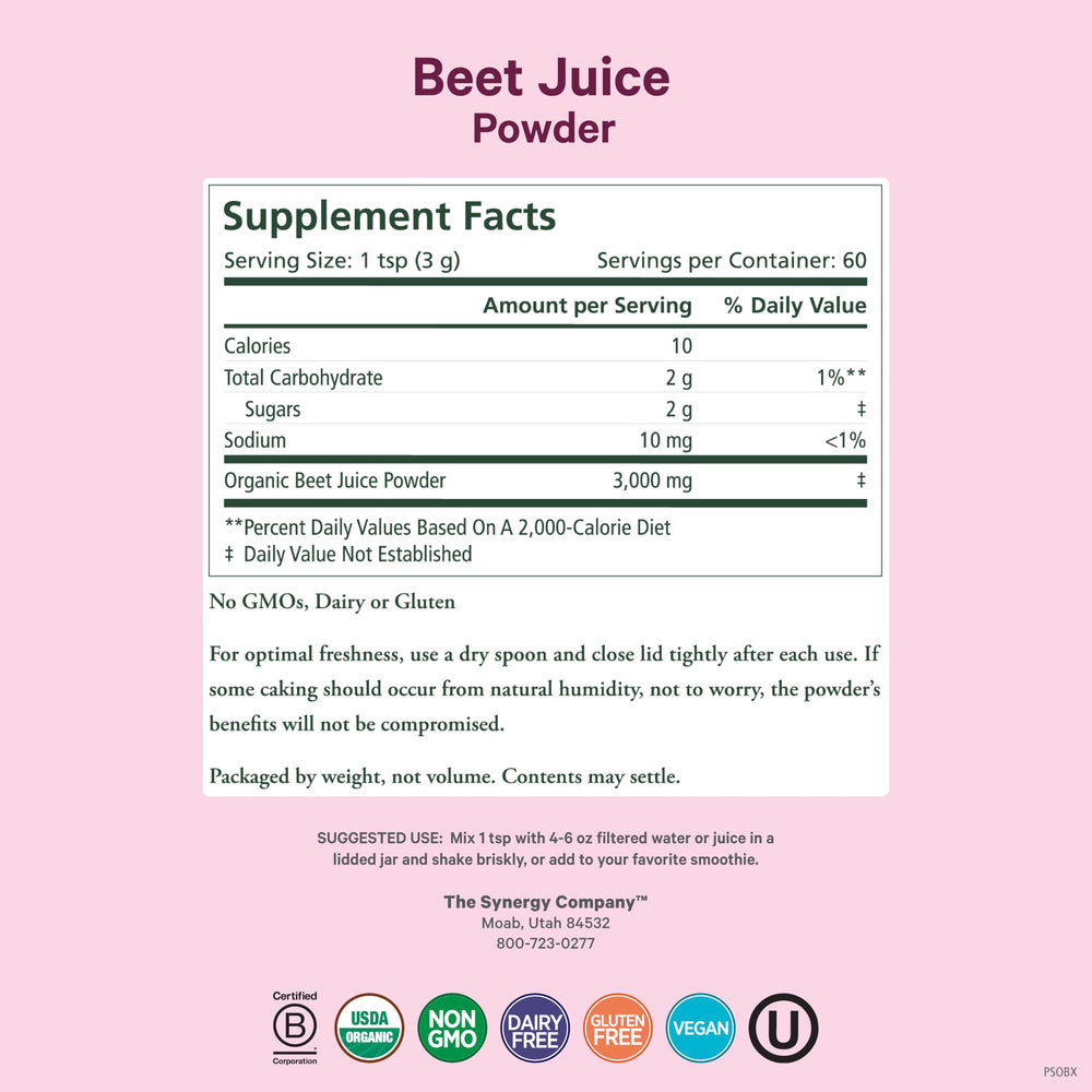 Scoop of beet juice powder with glass of water