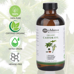 Close-up of amber glass bottle labeled organic castor oil