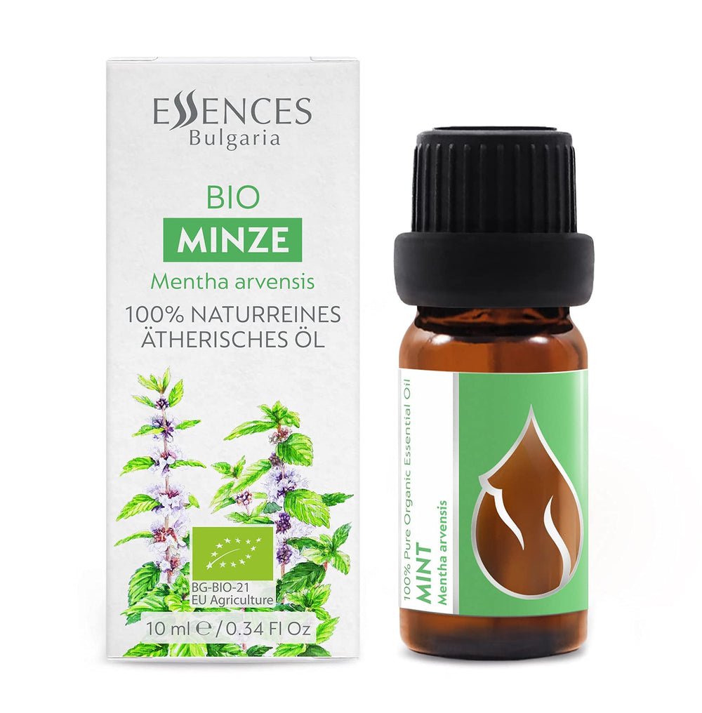 Close-up of mint essential oil bottle with dropper