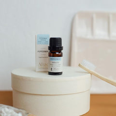 Dark glass peppermint oil bottle with dropper