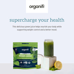 Pouring Organifi Green Juice powder into a glass of water