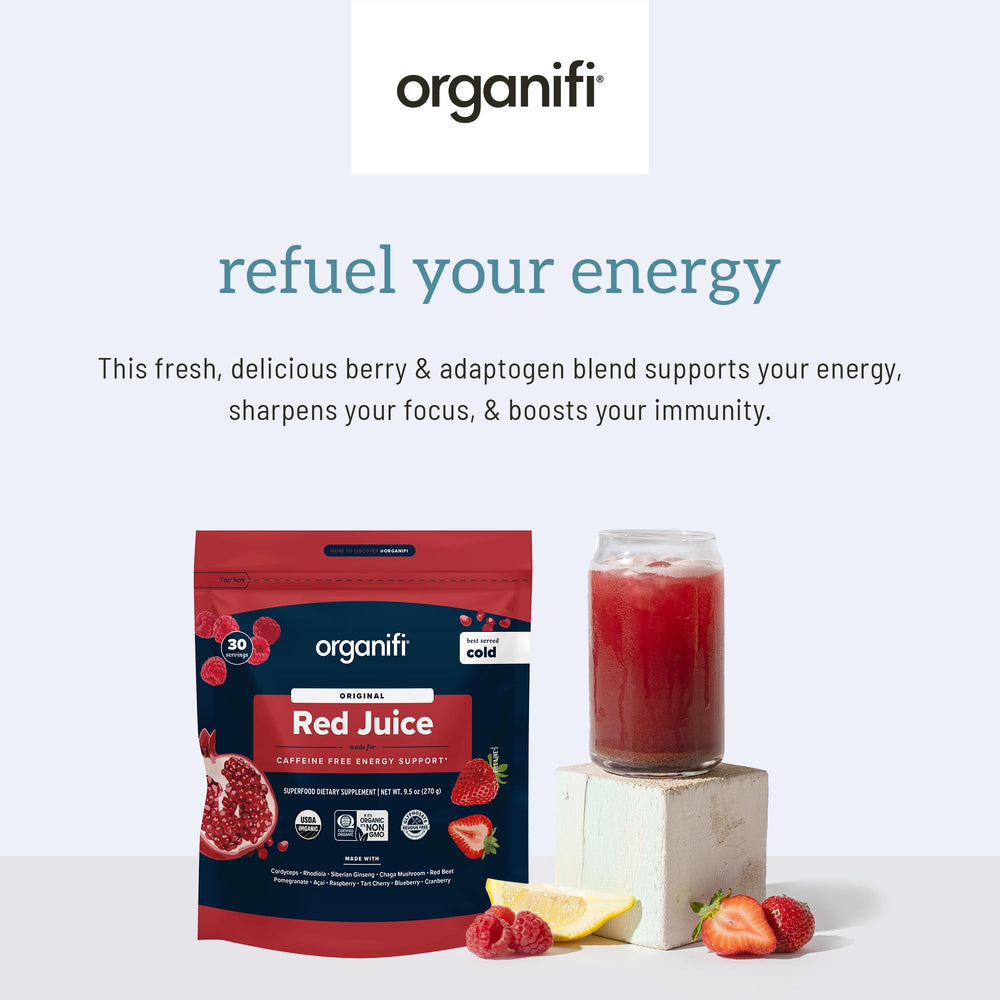 Glass of mixed Organifi Red Juice with lemon hints at digestion support.