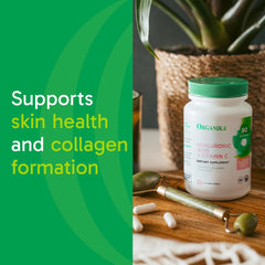 Close-up of Hyaluronic Acid and Vitamin C capsules