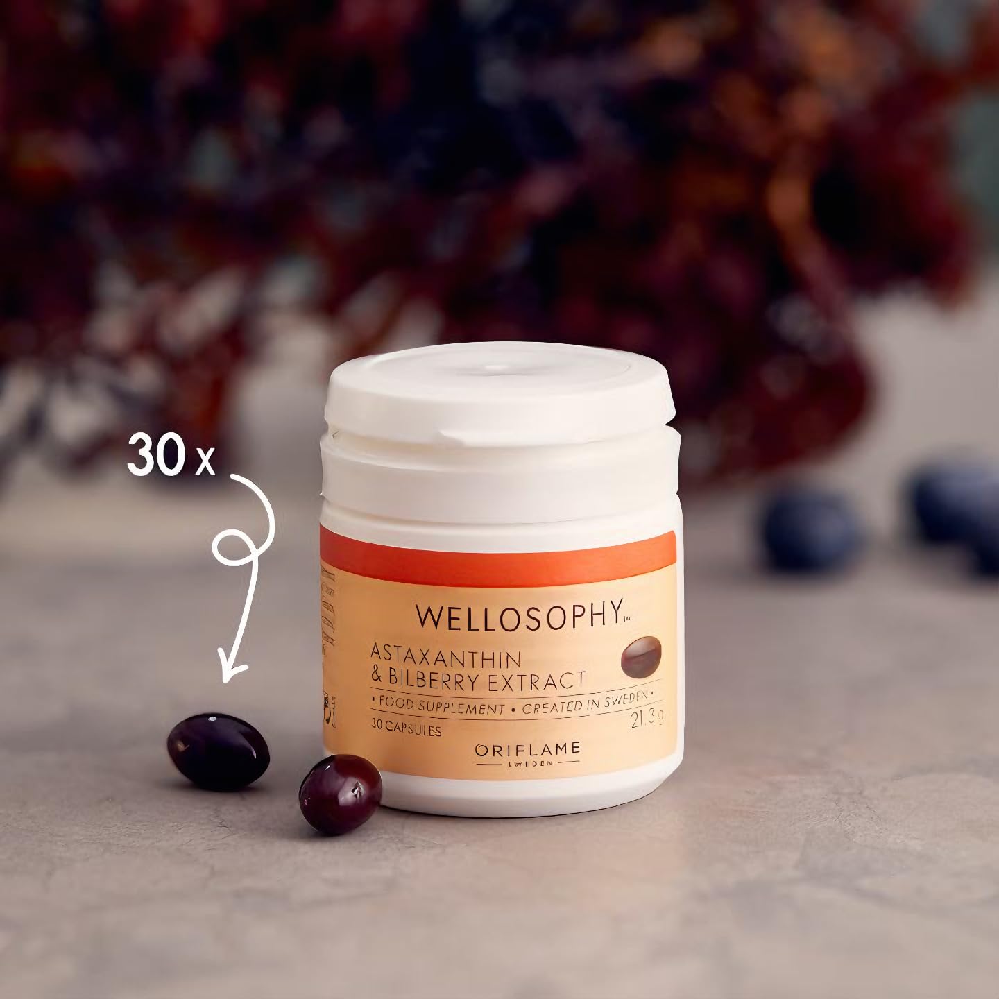 Bilberries and capsules illustrating antioxidant benefits