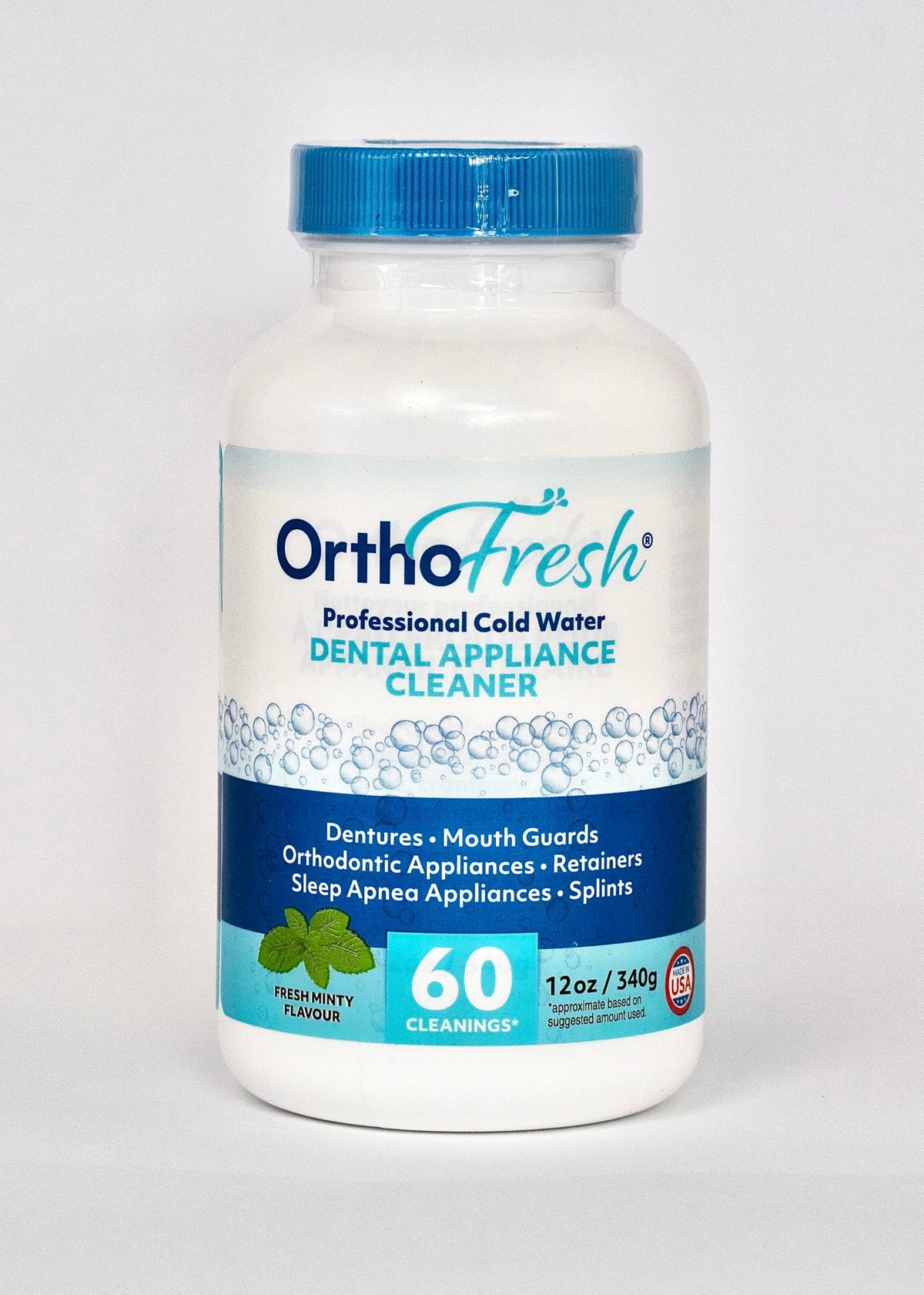 OrthoFresh packaging with scooper for dental appliance cleaner