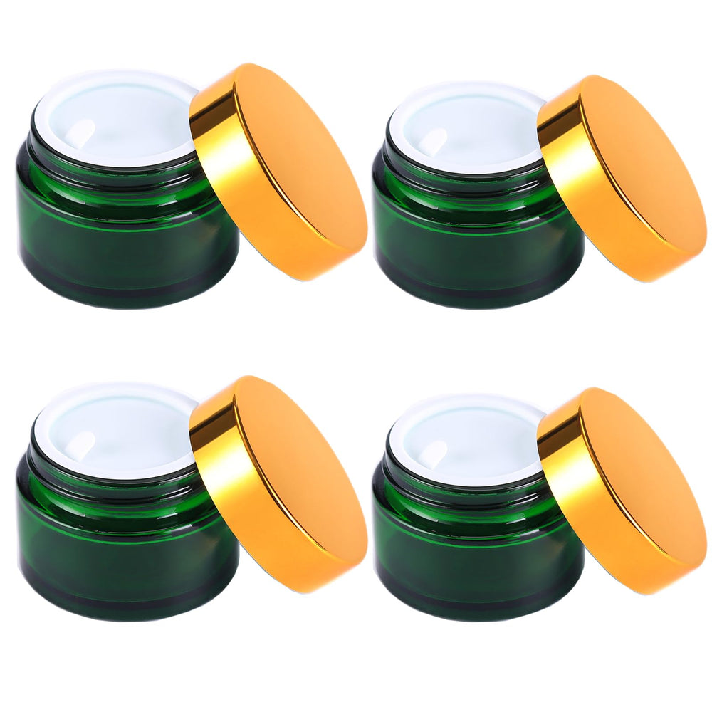 Over News green glass container jar 1 oz for creams and travel storage.