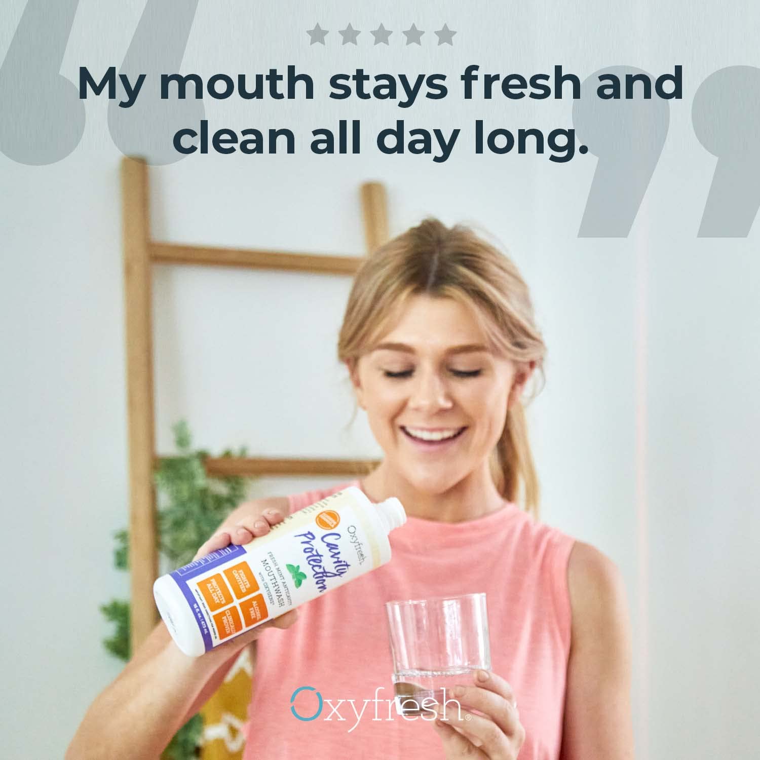 Close-up of Oxyfresh mouthwash label highlighting fluoride and non-staining formula
