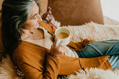 Preparing PAAVANI Golden Milk in a mug