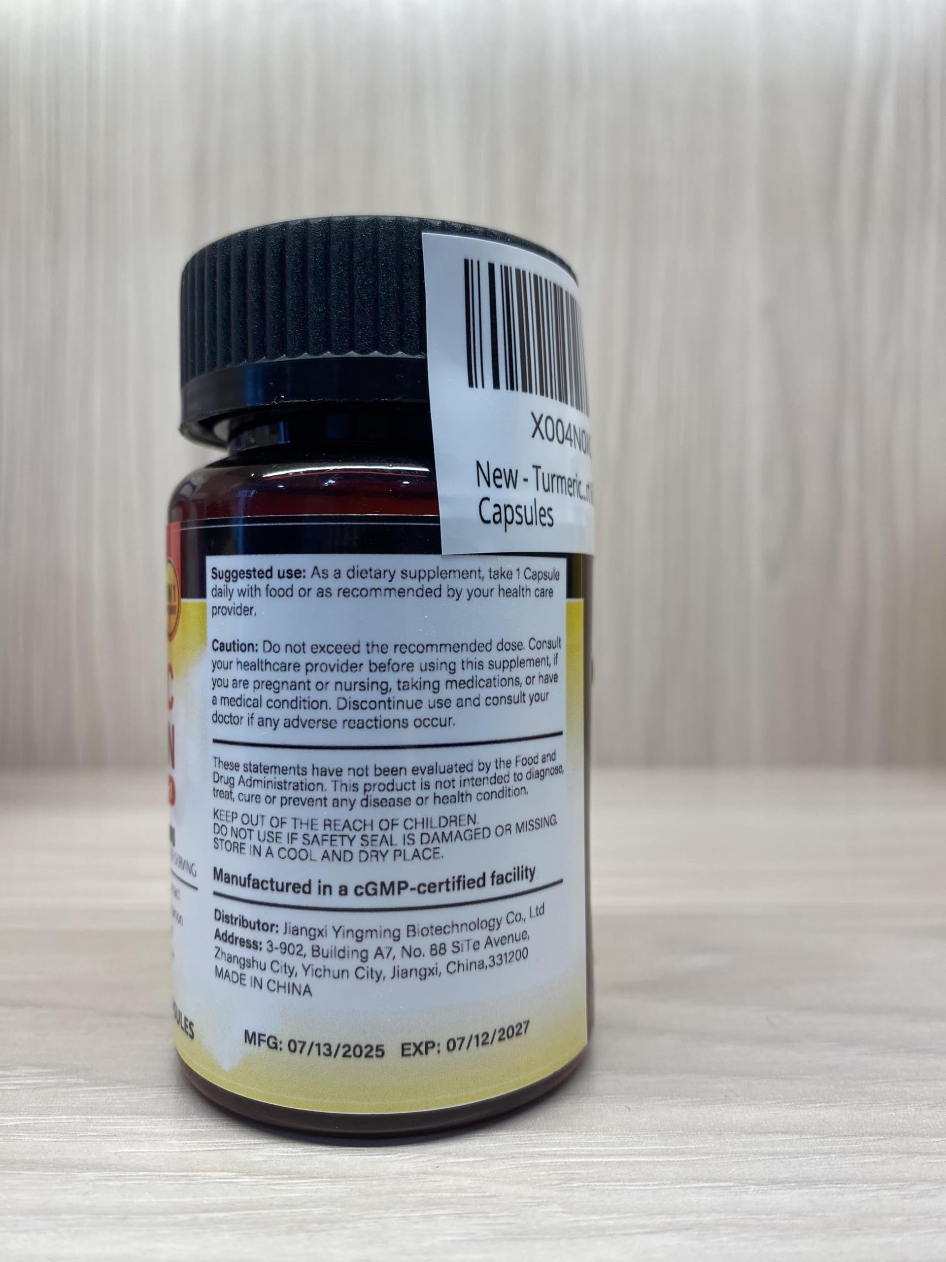 Product packaging and box with bottle of turmeric capsules