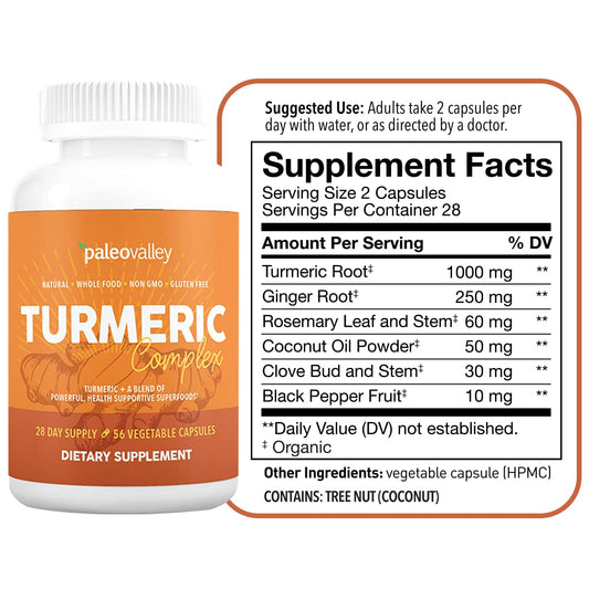 Close-up of Turmeric Complex capsules next to bottle