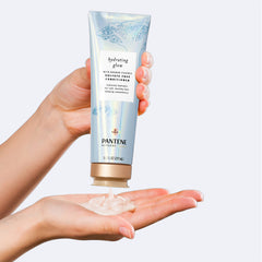 Pantene detangled, smooth hair shown during application.