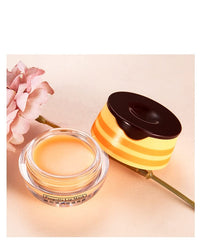 PAQIMAN Honey lip balm displayed as a daily beauty ritual.