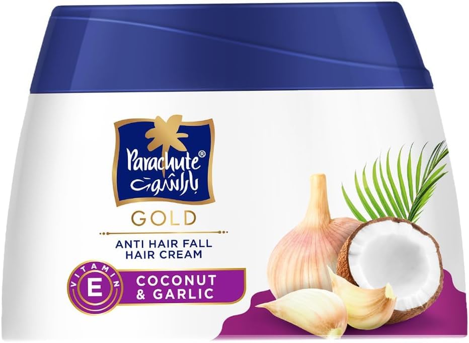 Parachute Gold anti-hairfall cream tub closeup highlights coconut oil conditioning