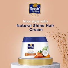 Parachute Gold hair cream application hands shows easy daily use.