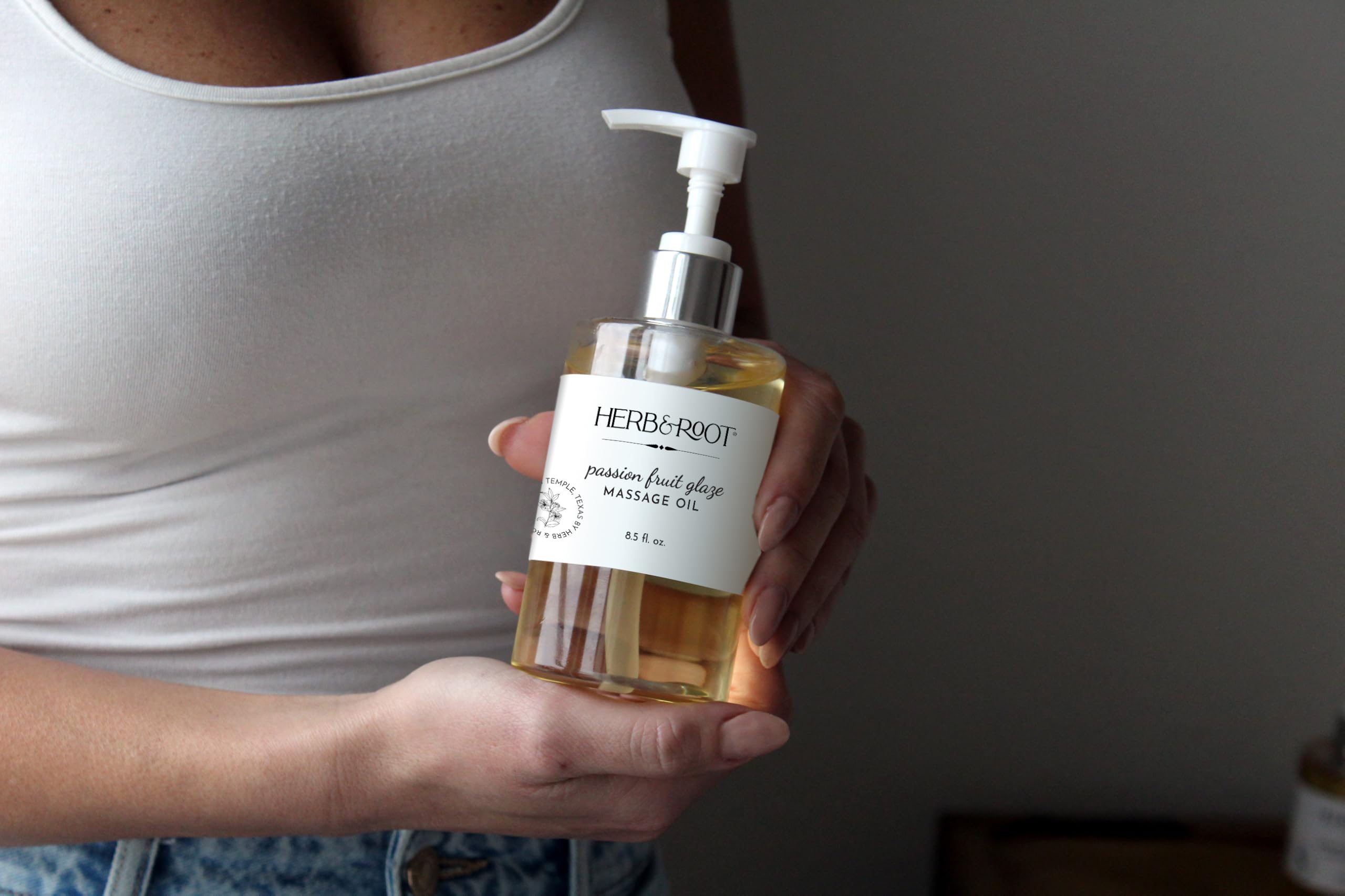 8.5 oz massage oil bottle angled for product photography