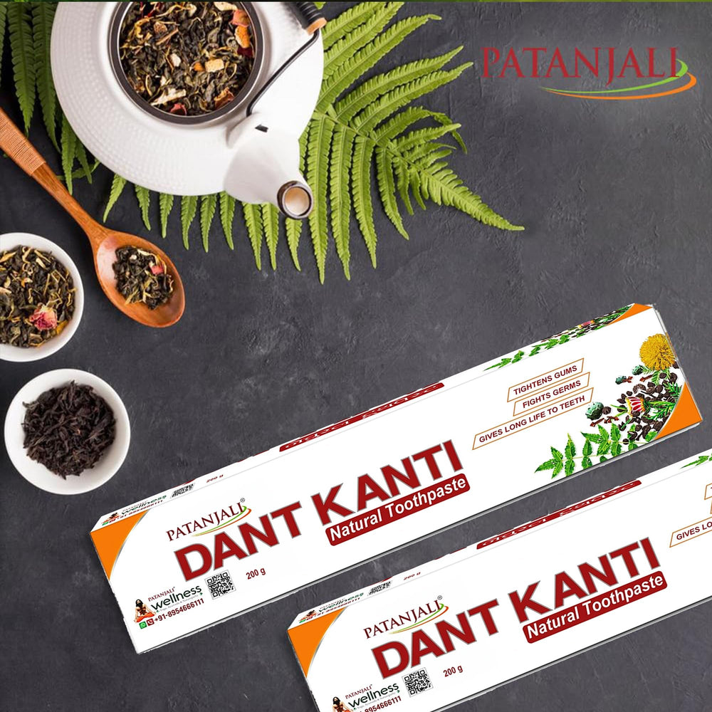 Lifestyle shot of brushing teeth with Patanjali Dant Kanti