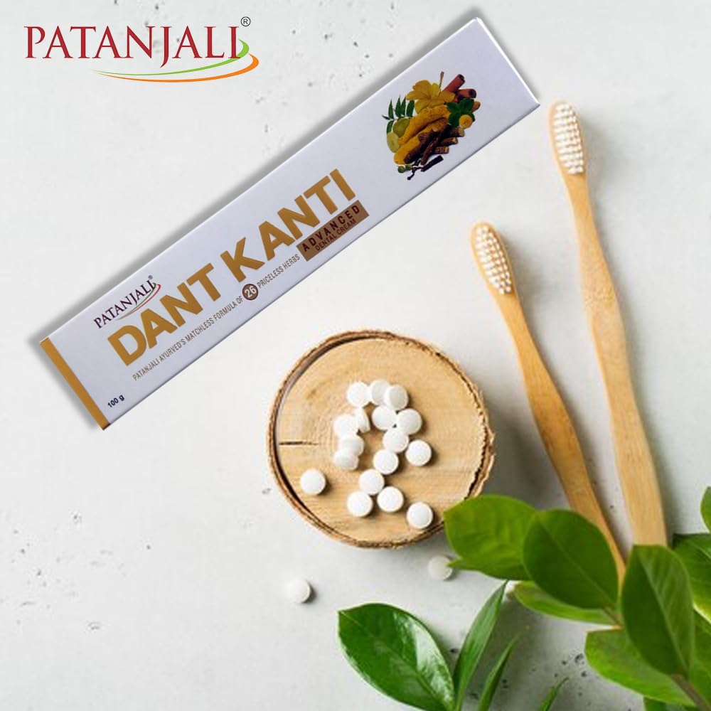 Toothbrush with Patanjali Advanced toothpaste on bristles