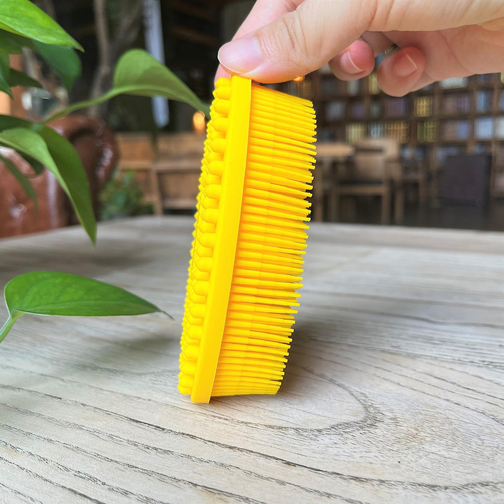 Penepico sensory brush whale-shaped is kid-friendly for scalp and body cleansing with soft silicone.