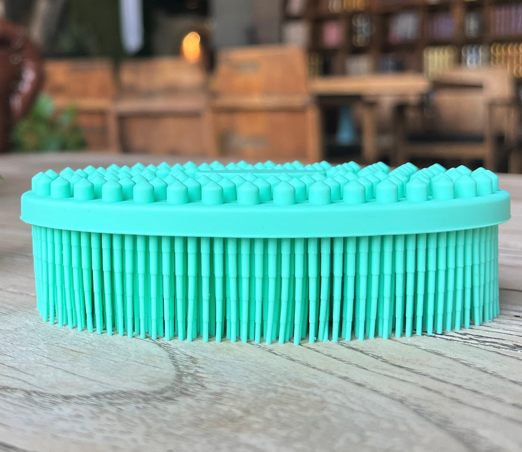 Penepico sensory brush teal oval front shows gentle stimulation for sensory-friendly kids