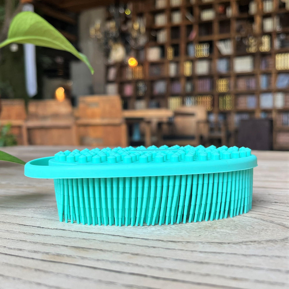 Penepico soft silicone body scrubber for gentle cleansing and tactile exploration.