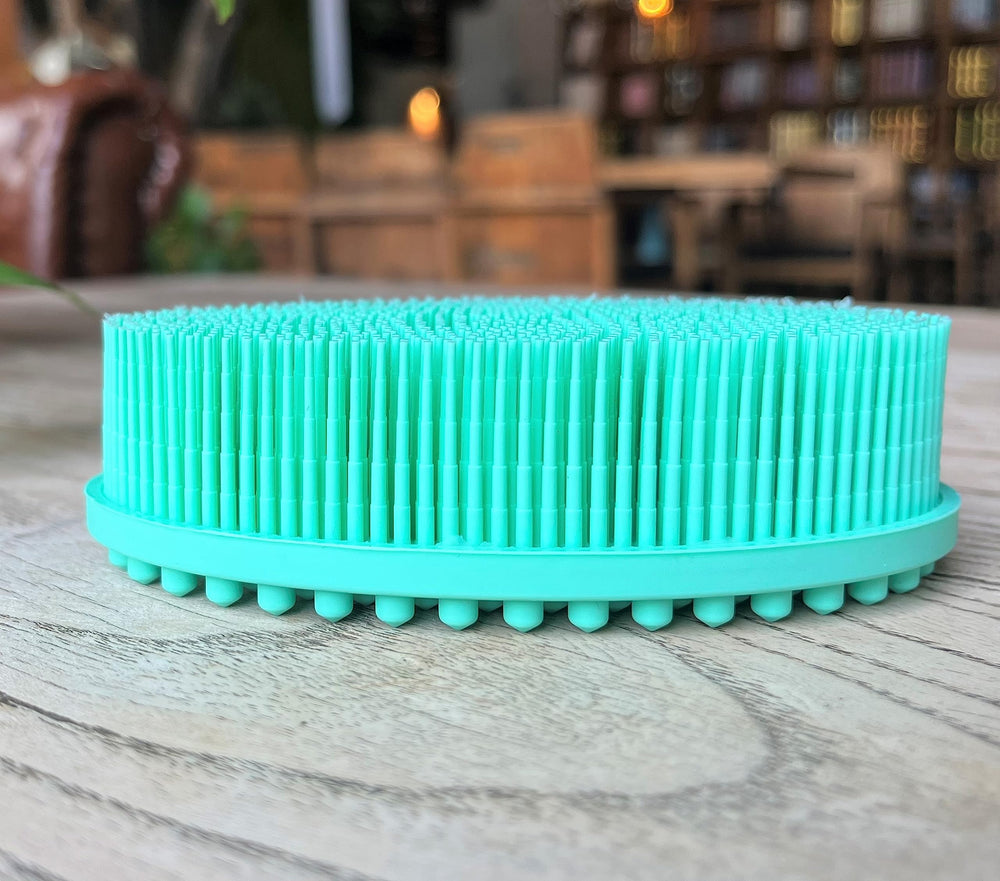 Penepico two-in-one bath and shampoo brush aids mess-free cleansing and scalp massage