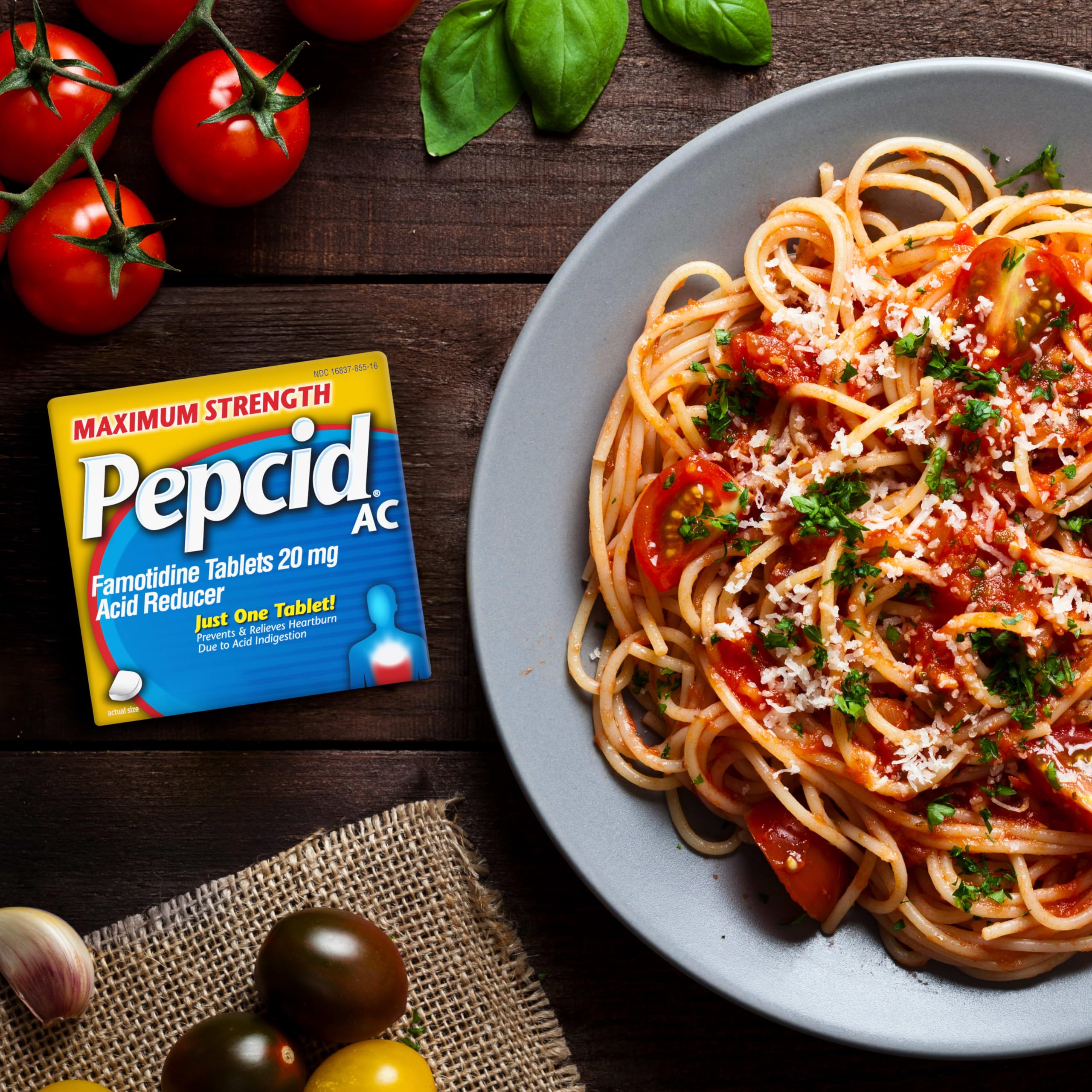 Pepcid AC office desk pack sits beside notebook for on-demand heartburn control.