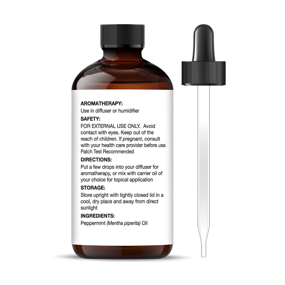 Close-up of Majestic Pure Peppermint Oil bottle with amber glass
