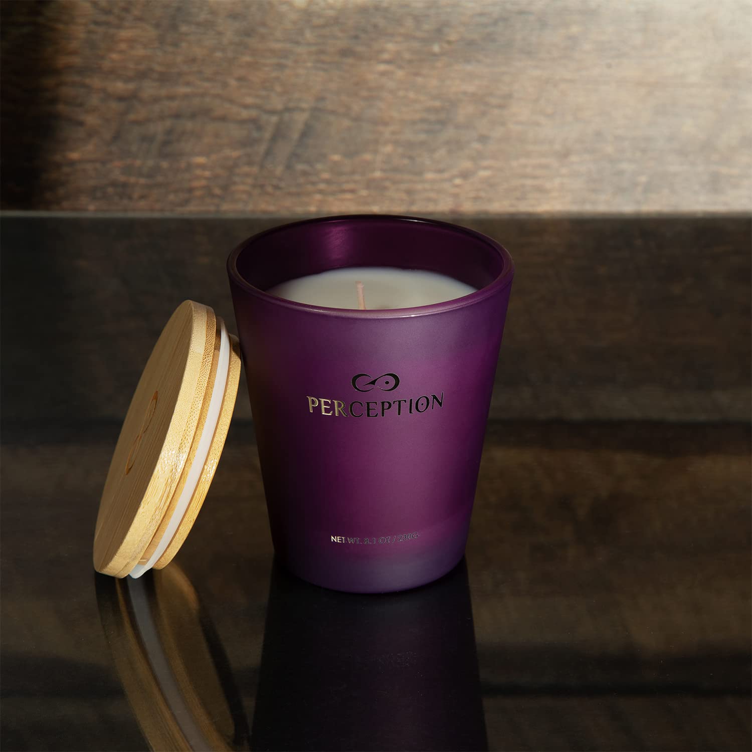 Perception Aromas compostable bamboo lid keeps candle fresh and eco-friendly.