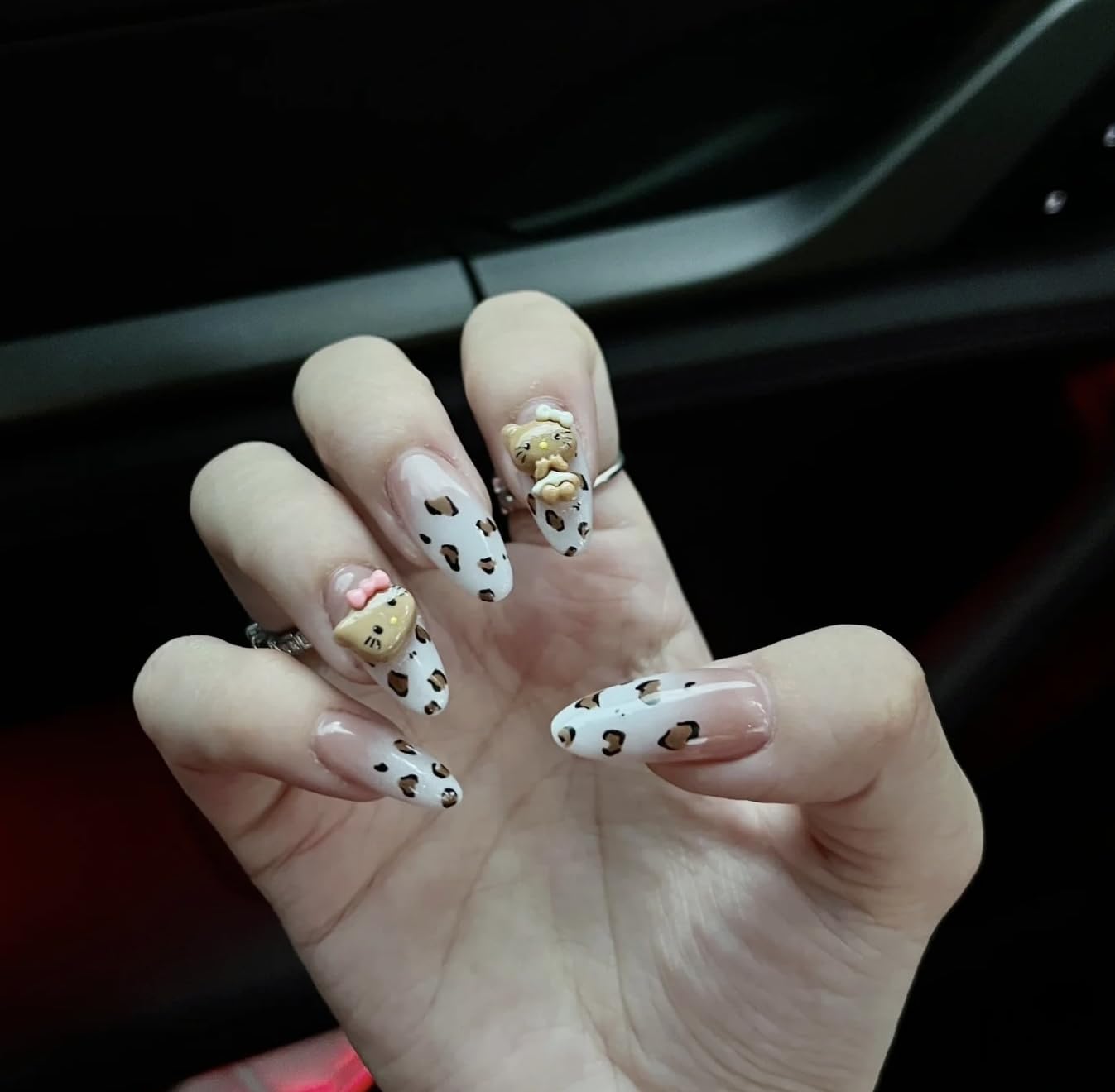 Close-up of Pethawata leopard nails, medium oval shape for easy fit