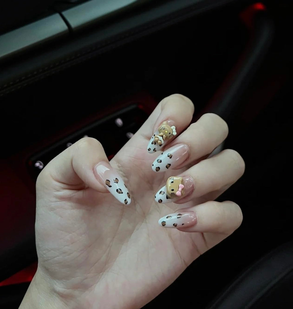 Pethawata leopard press-on nails on hand offer quick, stylish manicure