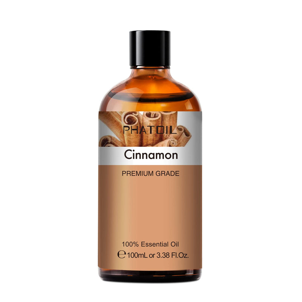 Close up of cinnamon essential oil bottle with amber glass and label