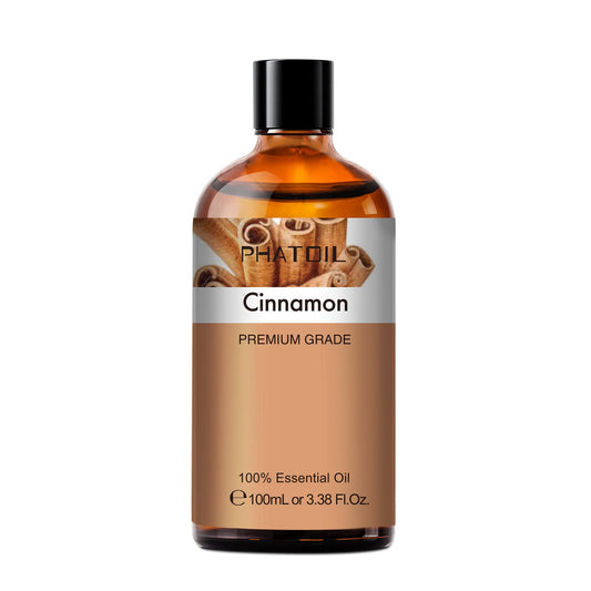Close up of cinnamon essential oil bottle with amber glass and label