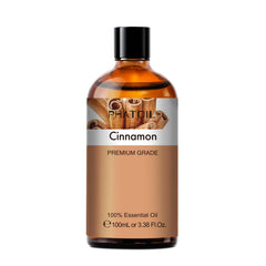 Close up of cinnamon essential oil bottle with amber glass and label