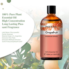 Close-up of glass dropper in grapefruit essential oil bottle