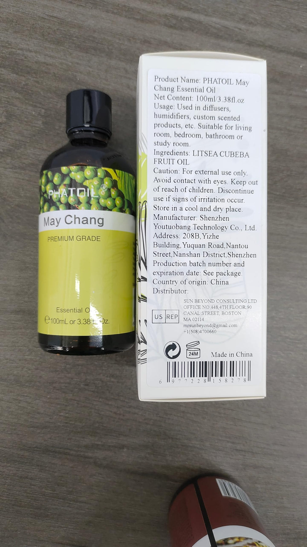 Massage blend of May Chang essential oil with carrier oil