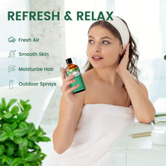 Close-up of PHATOIL Peppermint Essential Oil amber bottle